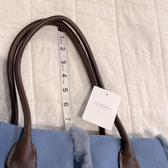 Liz Claiborne faux blue large handbag. Has faux blue trim and brown straps. - Picture 10 of 16
